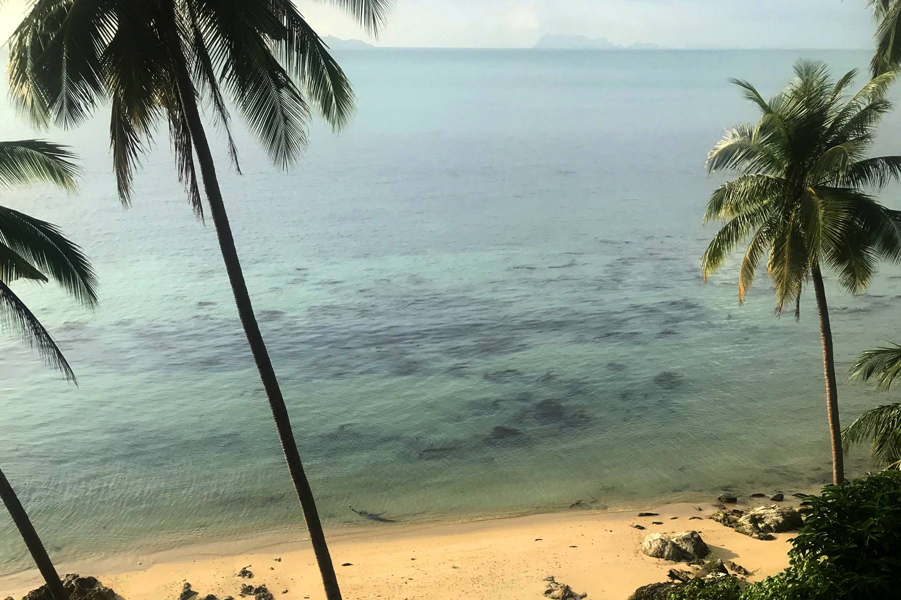 (SOLD) 4.3 Rai Beachfront land for sale in Taling Ngam